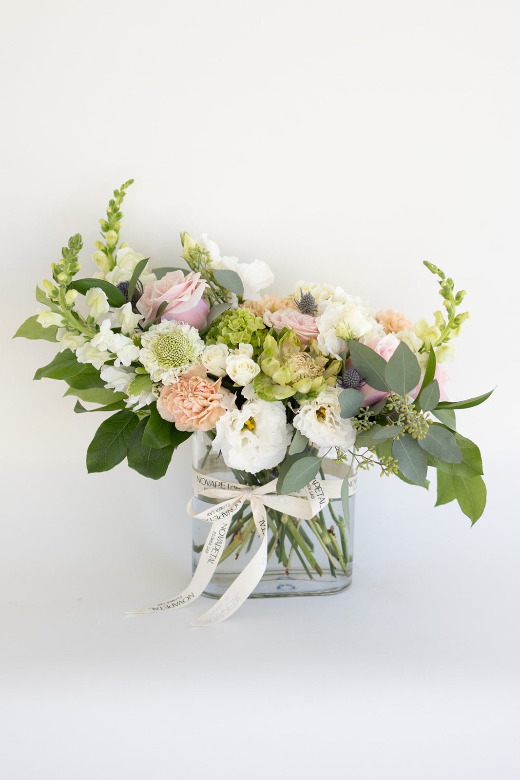 apulia plants Order Glass Arrangement Apulia with hydrangeas roses and carnations