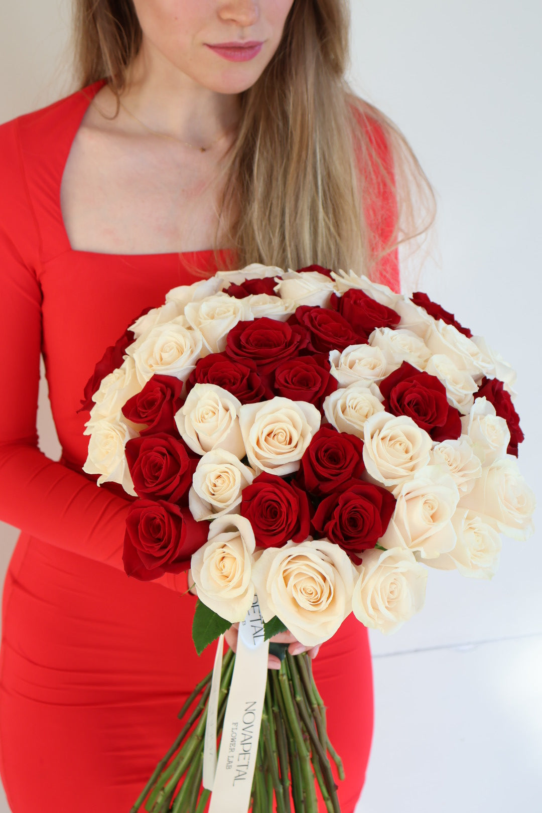 white dress with red roses Order Now