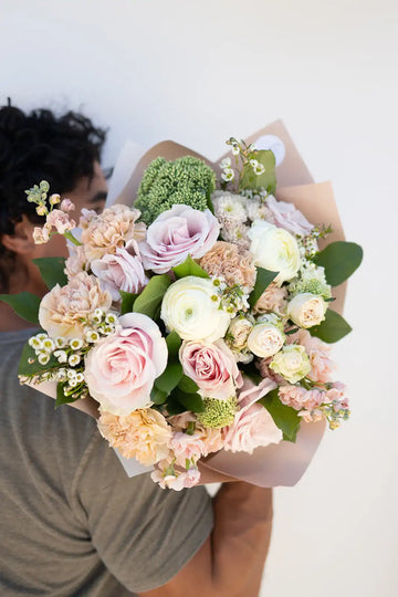 A man with a bouquet